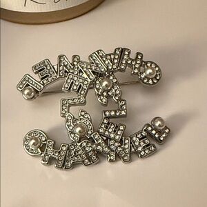 Silver-toned Fashion Jewellery Brooch embellished with rhinestones